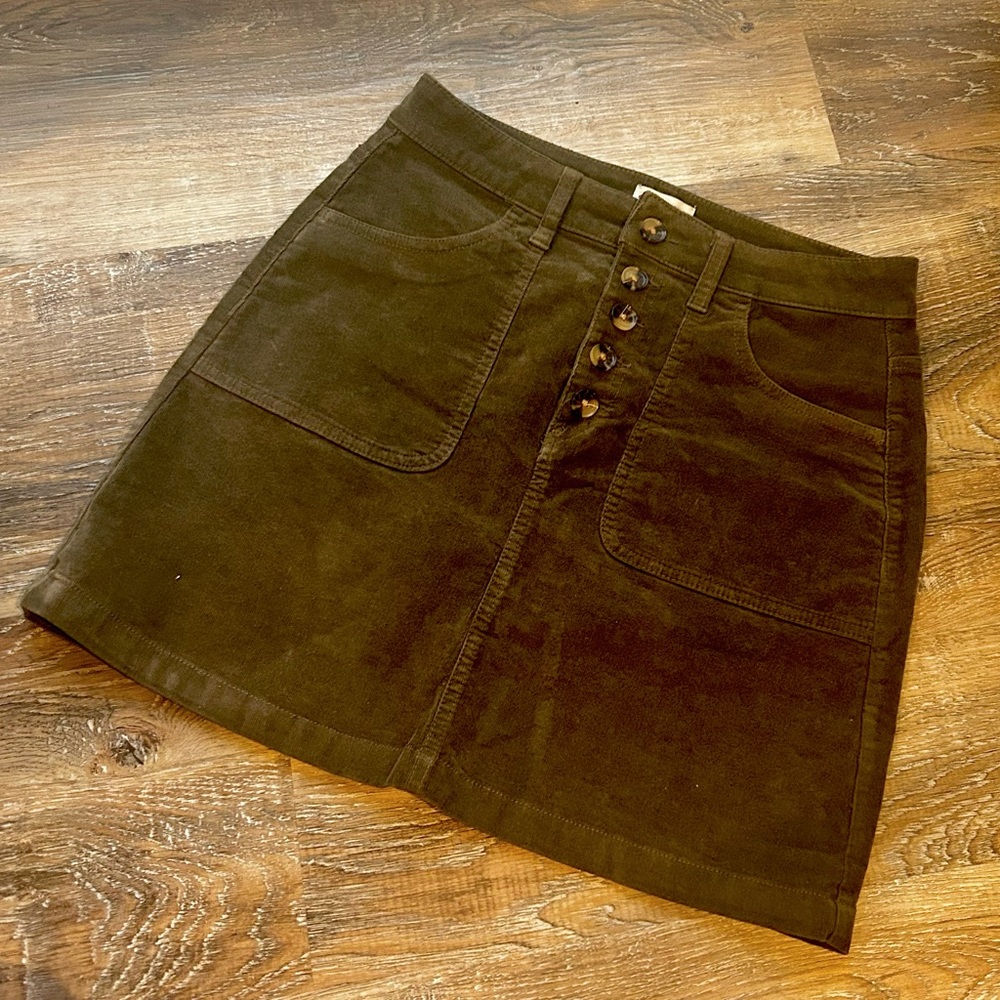 Olive green fine corduroy skirt with tortoiseshell style buttons